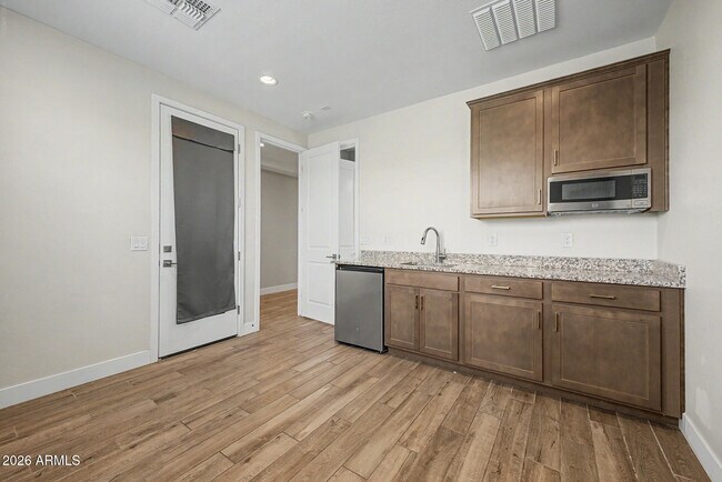 Building Photo - 9701 E Spiral Ave