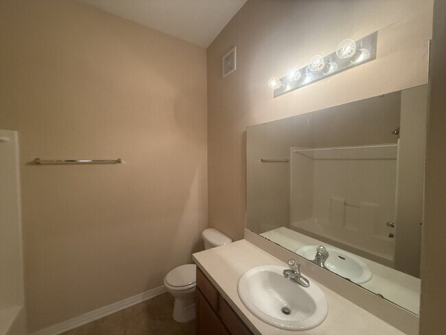 Building Photo - FOR RENT:  3 BEDROOM 2 BATHROOM CONDO LOCATED IN TIMBER RUN