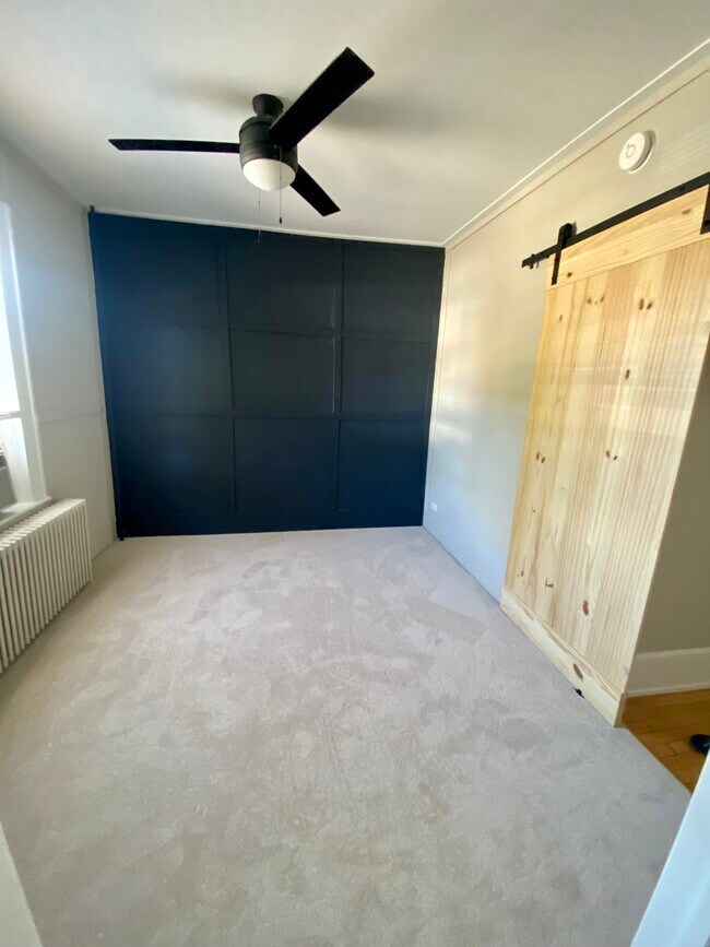 Bedroom with Accent Wall - 119 W State St