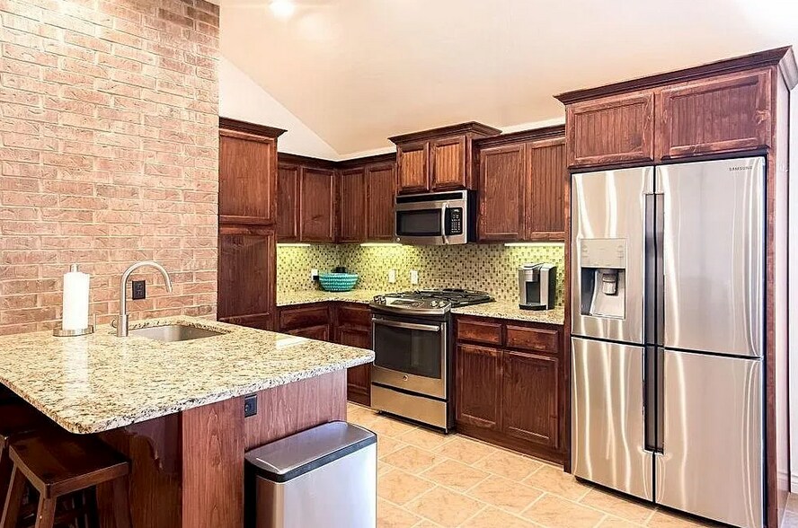 Open layout kitchen with island - 2452 NW 190th St