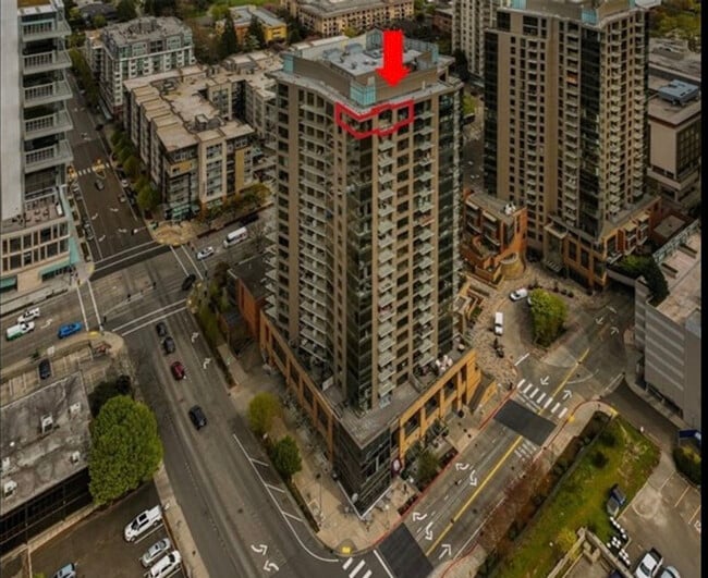 Offering top floor corner unit - 10610 NE 9th Pl