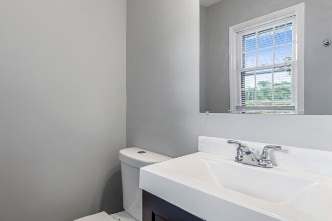Building Photo - Updated Home, Stainless Steel Appliances, Wood Like Flooring, Deck, Garage!