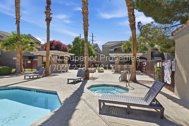 Building Photo - SW!! First floor unit with Balcony!! Gated!! Clubhouse!!  Community pool!! Spa!! Exercise Room!! ...