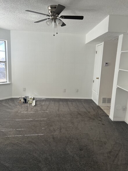 Den with ceiling fan - 1345 Trudy Elaine Dr