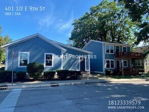 Building Photo - 401 1/2 E 9th St-