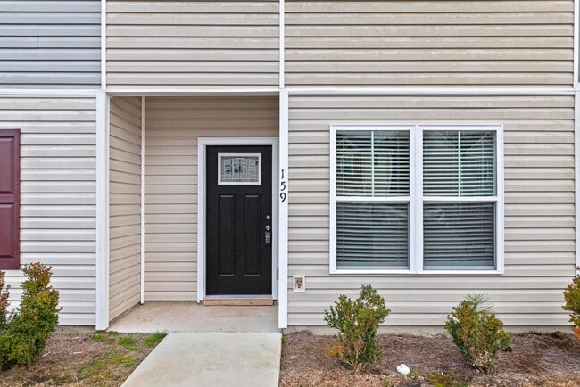 Building Photo - 50% off the first months rent if a lease is signed by 1/15