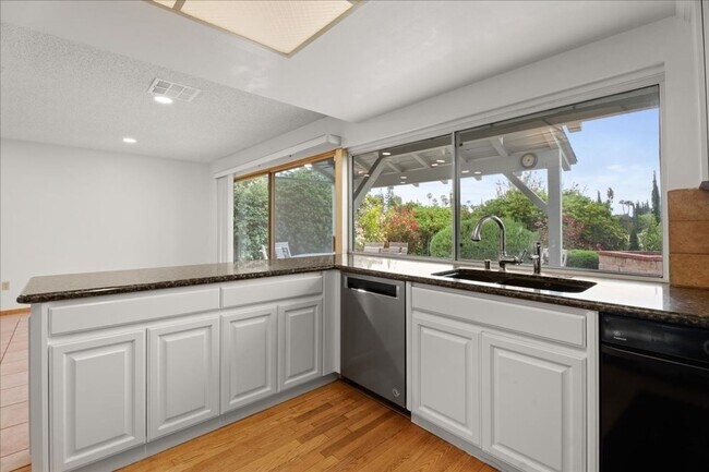 Building Photo - Updated 4-Bedroom with Pool and Bonus Loft...