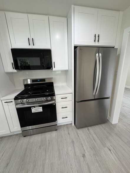 New stove and refrigerator - 7635 1/2 Lexington Ave