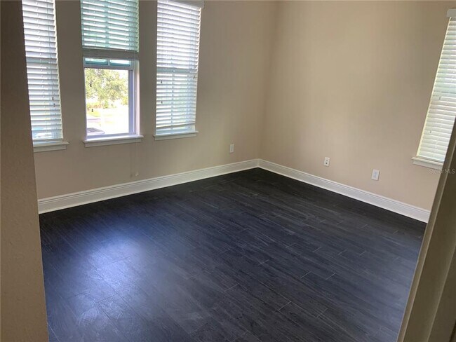 Building Photo - 8706 Tavistock Lakes Blvd