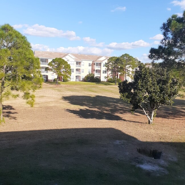 Building Photo - 14013 Fairway Island Dr