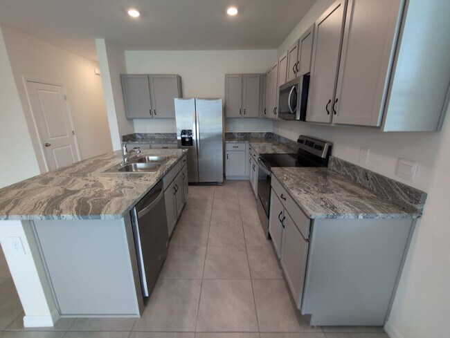 Building Photo - Fresh new build ~ 3 bed/ 2.5 bath Townhous...