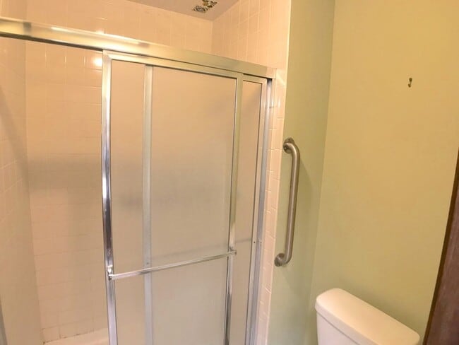 Building Photo - Spacious 2BR/2BA located on Golf Course in Rio Communities. Hardwood floors in living space. 2 Ca...