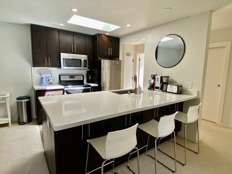 Large stone kitchen island - 1998 Pacific Ave