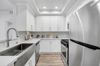 Building Photo - 311 S. Swall Drive Apartments
