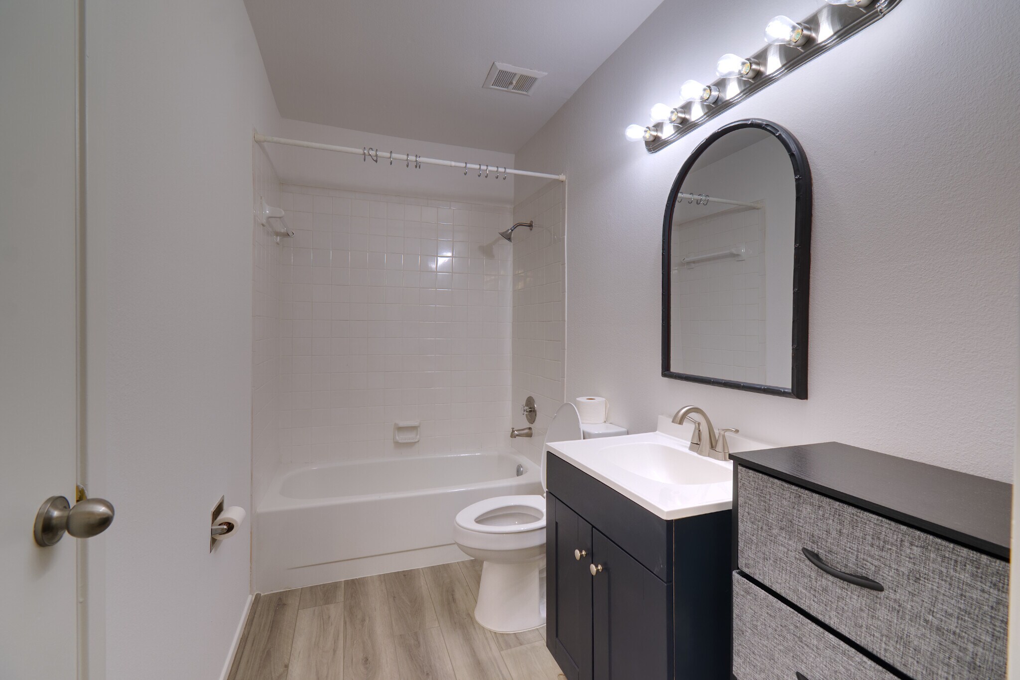 Secondary Bathroom, in an en-suite design with the secondary bedroom, with its private storage area - 2025 Augusta Dr