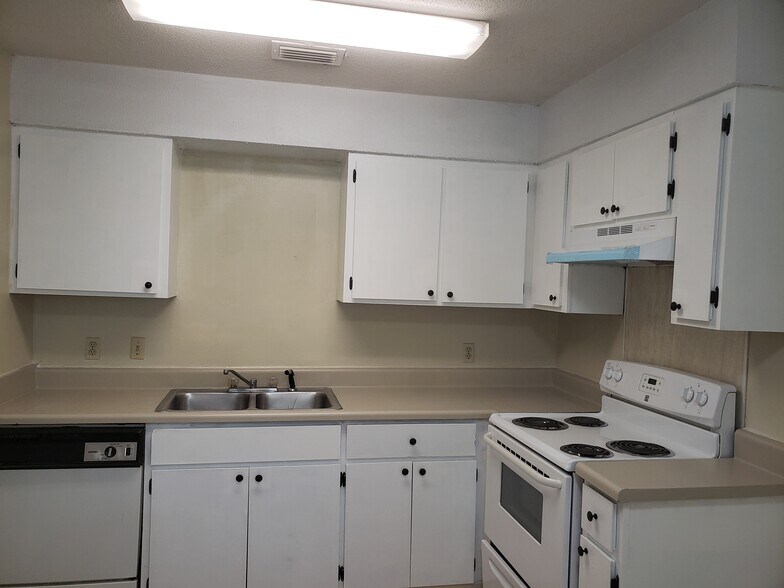 Newly refinished cabinets and counter tops with new range hood - 32A 5th St