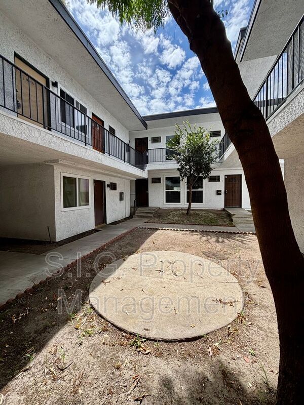Building Photo - 10635 Sherman Grove Ave