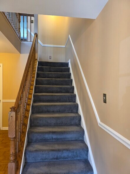1st floor stairs to 2nd floor living room - 8628 Indian Springs Rd