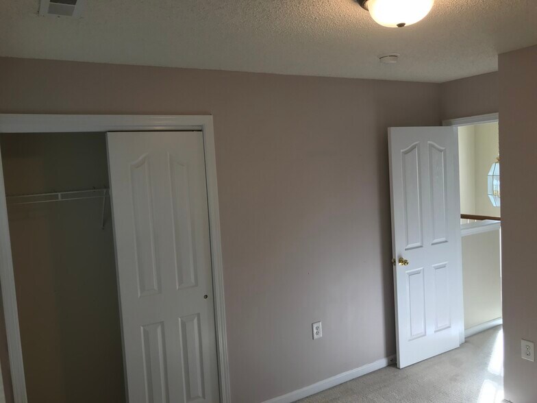 SECOND GUEST BEDROOM CLOSET AND ENTRY - 2808 Cougar Hill Ct