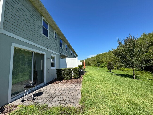 Building Photo - Beautiful End Unit Townhome Near Lake Nona w/ 2-Car Garage & Conservation Views!