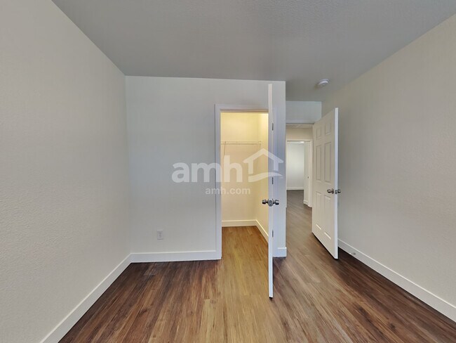 Building Photo - 10749 Artesia Wells St