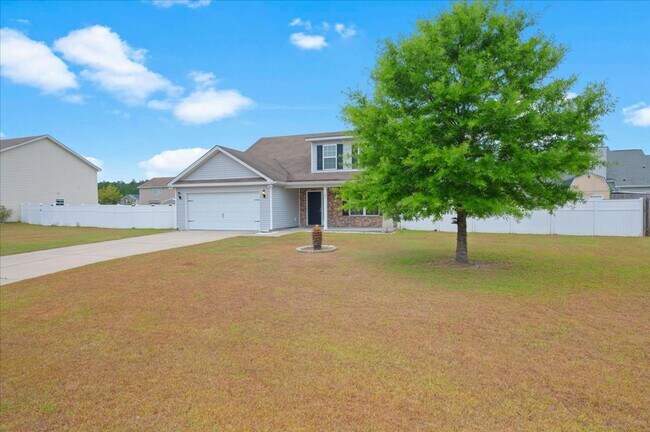 Building Photo - Spacious 5-Bedroom Home with Screened Patio & Private Fenced Yard in Guyton