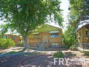 Building Photo - Raised Ranch with Second Kitchen in Prime ...