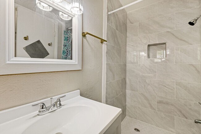 Building Photo - 4-Bed Home with Renovated Kitchen & Baths – Plenty of Space!