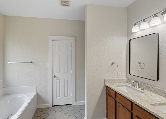 Building Photo - Discover the perfect blend of comfort and space at 6323 Myrtle.