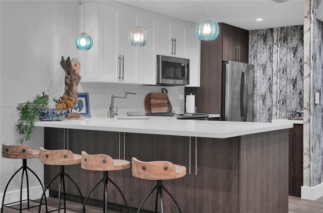 Building Photo - 5555 Collins Ave