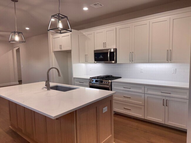 Building Photo - One Month Rent Free - 4 bedrooms - 3 full baths - Brand New