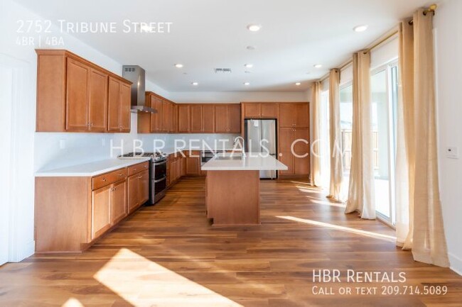 Building Photo - Spacious 4-Bed, 4-Bath Retreat on Tribune ...