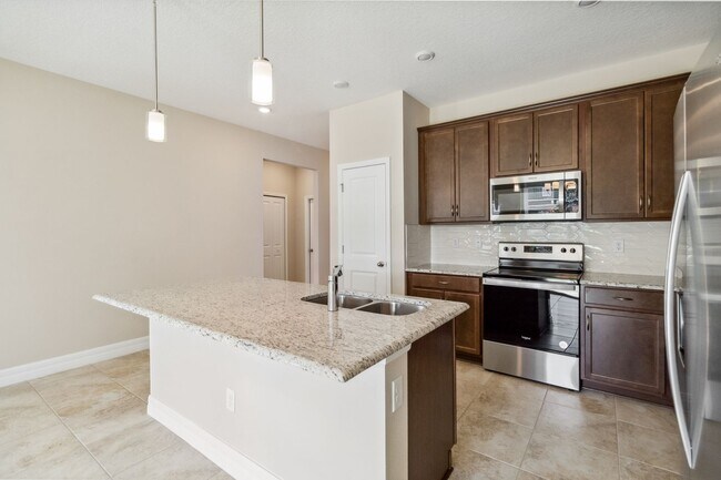 Building Photo - Beautiful New Energy Efficient 4/2 Close t...