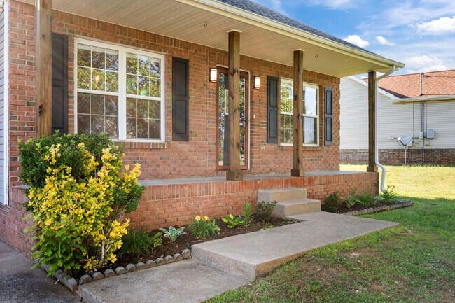 Building Photo - Charming Brick Home with Soaring Ceilings & Updated Finishes!