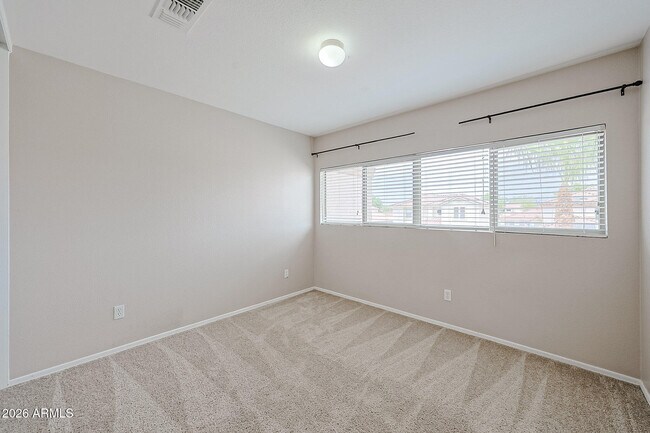 Building Photo - 15569 W Gelding Dr