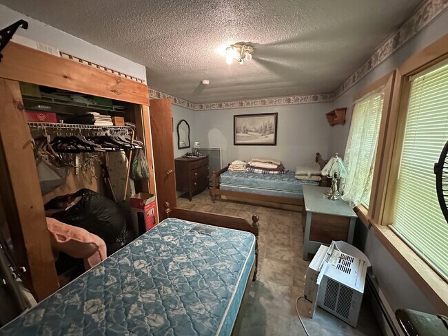 Building Photo - Charming 3BR Waterfront Retreat with Sunroom, Brick Accent & Scenic Lake Views