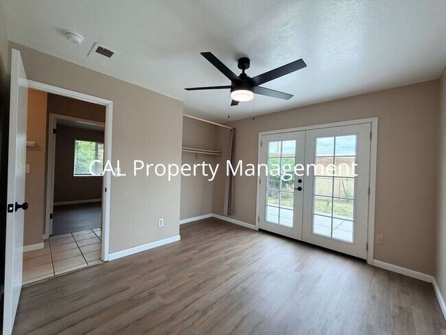 Building Photo - Spacious 4-Bedroom Home with 2-Car Garage & Backyard Oasis