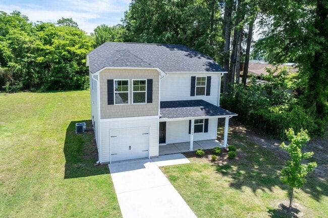 Building Photo - Modern Four Bedroom Home