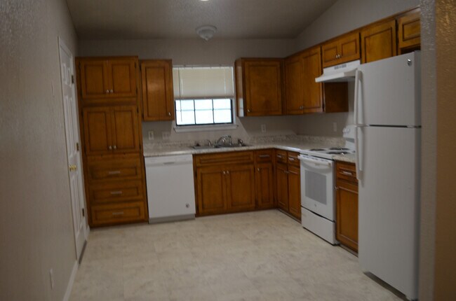 Building Photo - This 3 Bedroom Home with Fireplace is a must see!