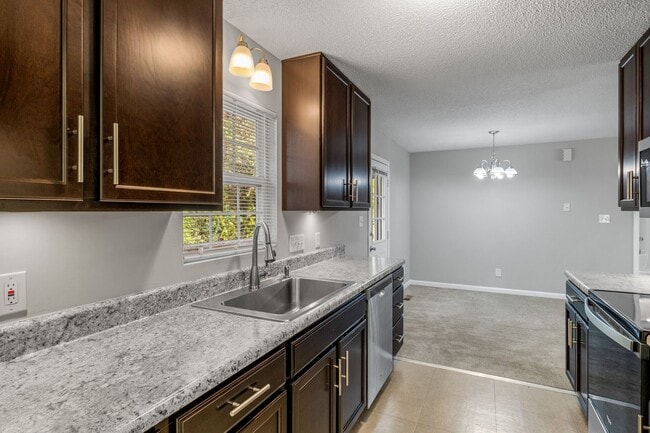 Building Photo - SW - Like New Home! Newer SS Appliances & Cabinets, Ceiling Fans, Blinds, Front Porch and Deck. M...