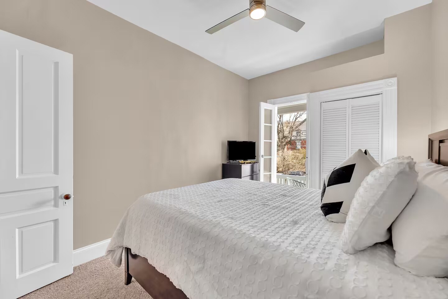 Bedroom 2 includes a covered porch. - 1104 Cross Ln