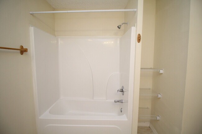 Building Photo - West Pensacola Duplex Living — 3BR Home with Open Floor Plan, Eat-In Kitchen, Covered Patio & Low...