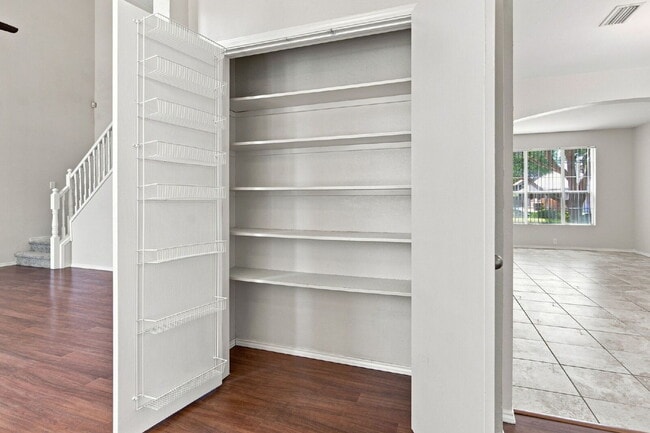 Building Photo - "Spacious Two-Story Home with Multiple Living Spaces and and Expansive Backyard!"