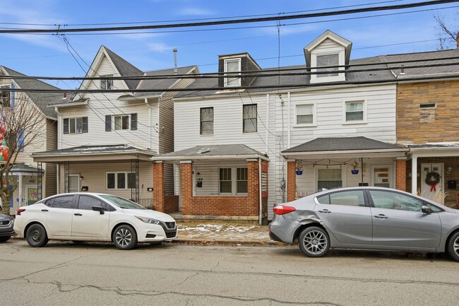 Building Photo - Charming 3-Bedroom Pittsburgh Home with Spacious Yard and Classic Porch