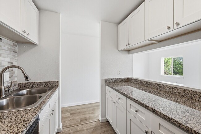 Building Photo - $1,340.95 with $300 Off the first month's rent,  2 Beds - 1 Bath, Condo in Denver with Granite Co...