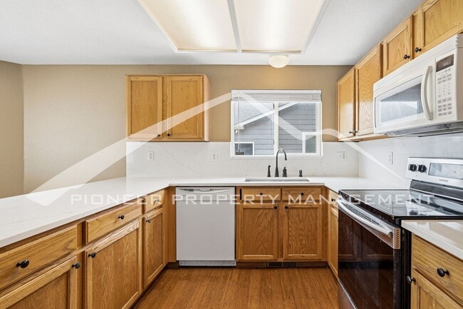 Building Photo - Spacious Home with Central AC and Fenced Yard