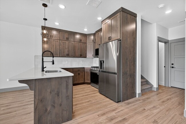 Building Photo - BRAND NEW3 BED 2.5 BATH TOWNHOME WITH 2 STALL GARAGE