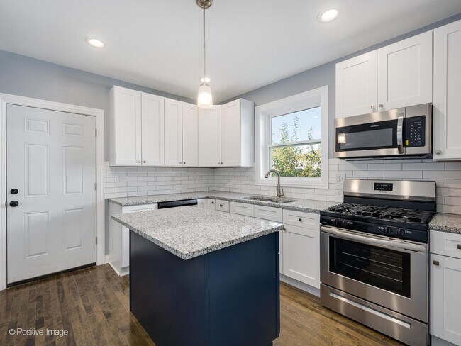 Building Photo - 5156 S Spaulding Ave