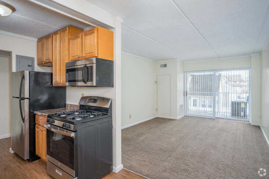 Remodeled Kitchen & Living Room from Dining Room - River Bluff Apartments