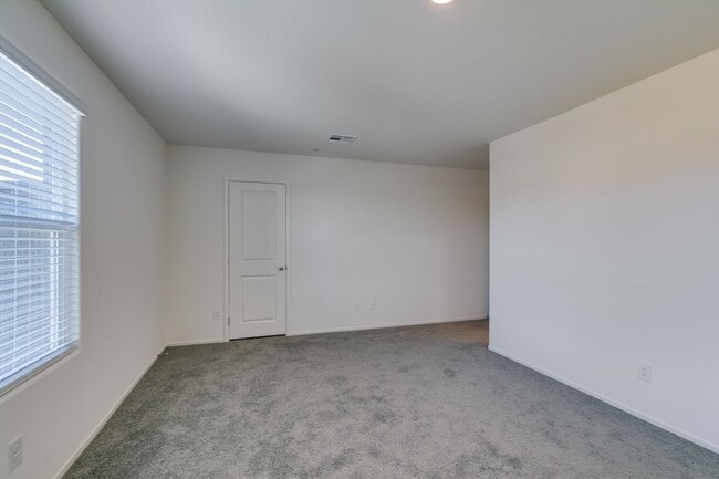 Building Photo - Gorgeous Townhome with upgrades in gated community* 3 large bedrooms, 2 car garage*Community pool...